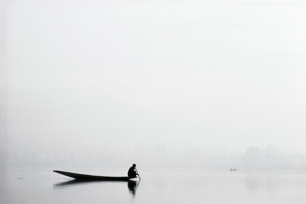 Silhoutted Boater in Fog